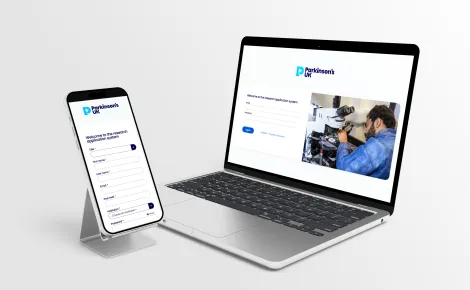 Phone and computer showing a website redeveloped by OWA